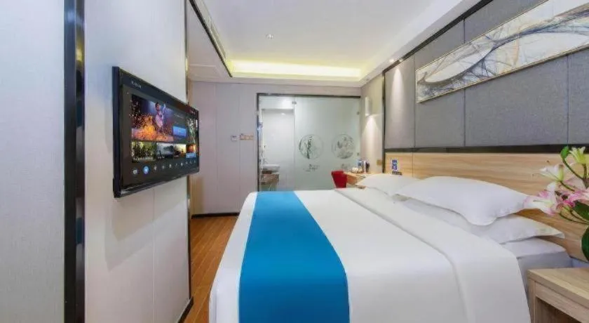 Bed in Wenxing Hotel Guangzhou Gangding Metro Station Branch