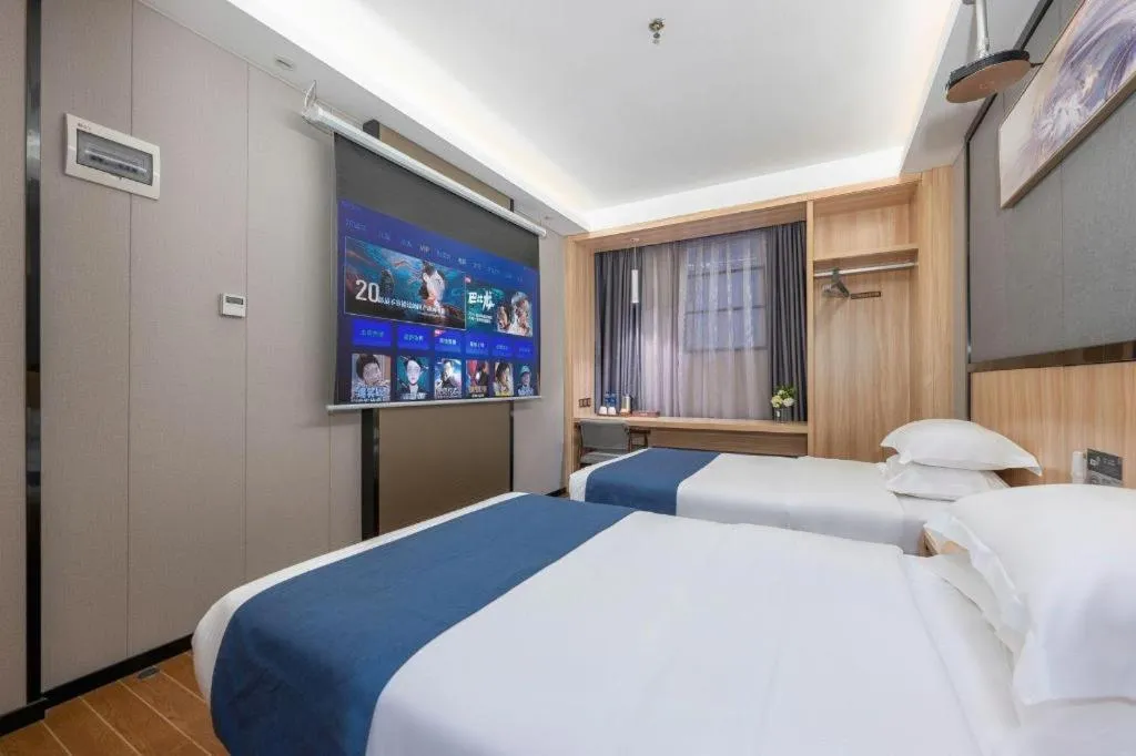 Bed in Wenxing Hotel Guangzhou Gangding Metro Station Branch