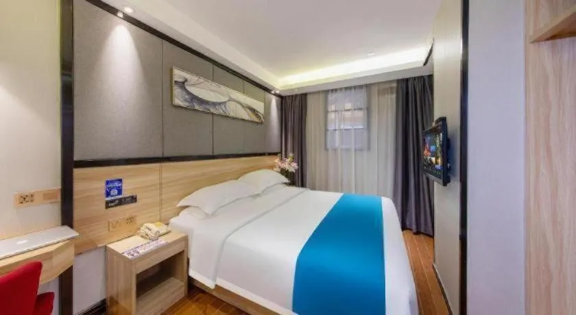 Bed in Wenxing Hotel Guangzhou Gangding Metro Station Branch