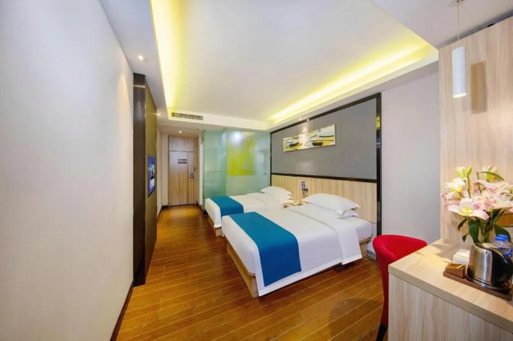 Bed in Wenxing Hotel Guangzhou Gangding Metro Station Branch