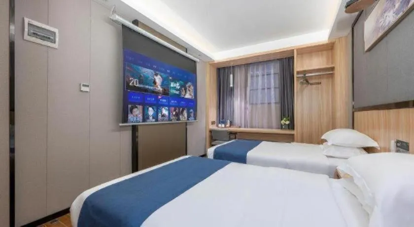 Bed in Wenxing Hotel Guangzhou Gangding Metro Station Branch