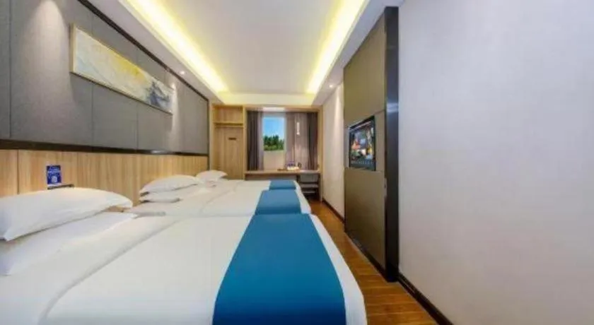 Bed in Wenxing Hotel Guangzhou Gangding Metro Station Branch