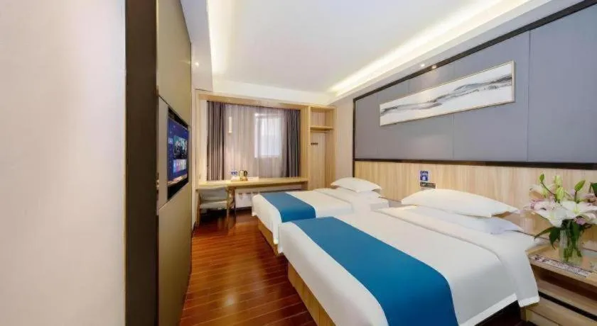 Bed in Wenxing Hotel Guangzhou Gangding Metro Station Branch