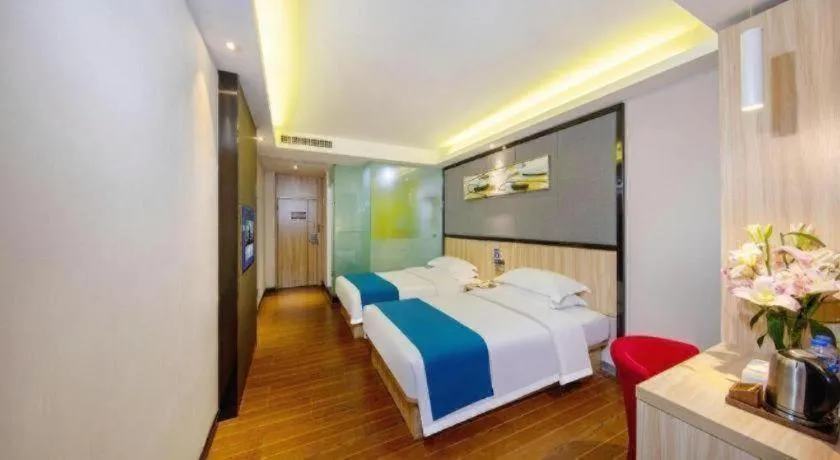 Bed in Wenxing Hotel Guangzhou Gangding Metro Station Branch