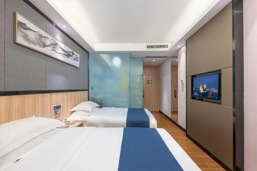 Bed in Wenxing Hotel Guangzhou Gangding Metro Station Branch