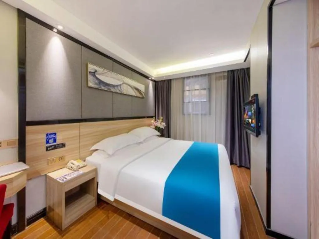 Bed in Wenxing Hotel Guangzhou Gangding Metro Station Branch