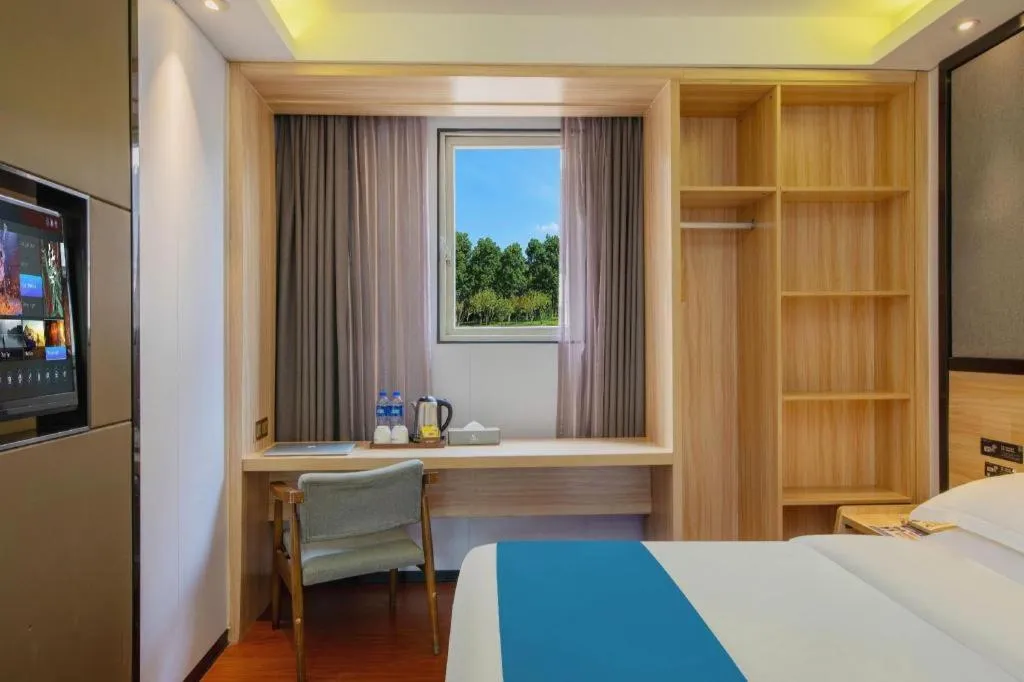 Bed in Wenxing Hotel Guangzhou Gangding Metro Station Branch