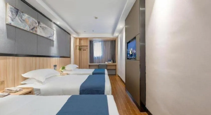 Bed in Wenxing Hotel Guangzhou Gangding Metro Station Branch