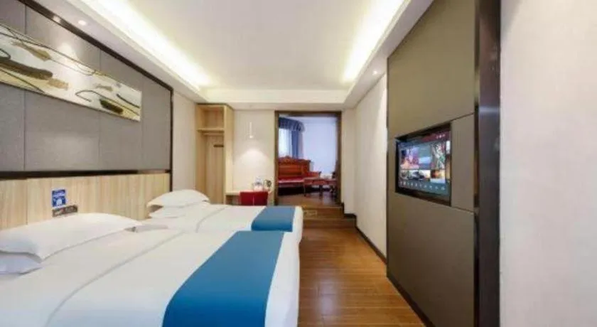 Bed in Wenxing Hotel Guangzhou Gangding Metro Station Branch