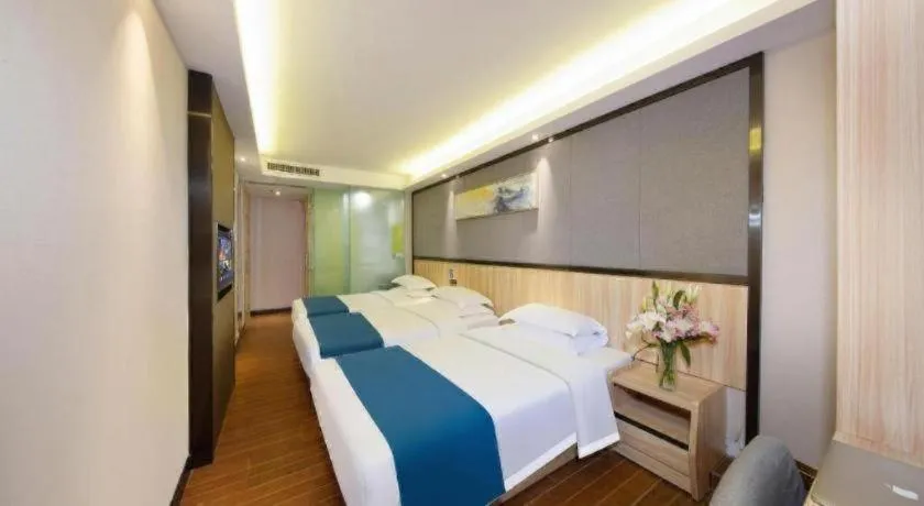 Bed in Wenxing Hotel Guangzhou Gangding Metro Station Branch