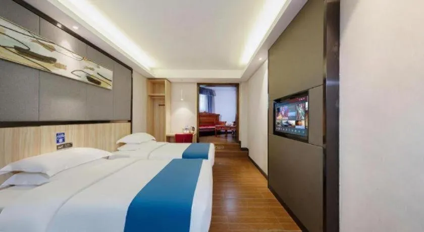 Bed in Wenxing Hotel Guangzhou Gangding Metro Station Branch