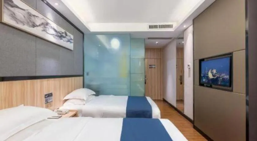 Bed in Wenxing Hotel Guangzhou Gangding Metro Station Branch