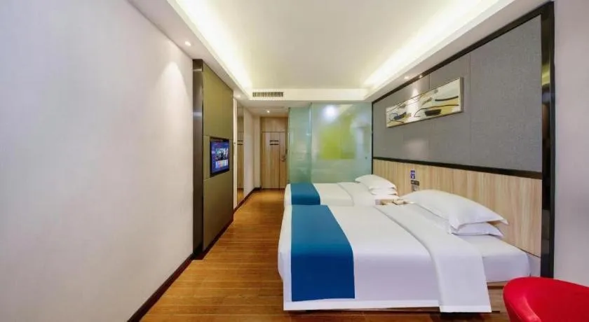 Bed in Wenxing Hotel Guangzhou Gangding Metro Station Branch