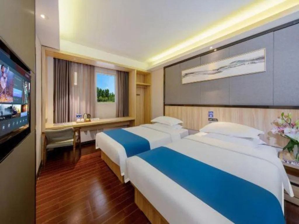 Bed in Wenxing Hotel Guangzhou Gangding Metro Station Branch