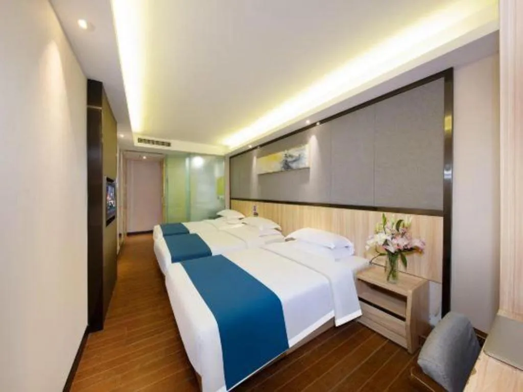 Bed in Wenxing Hotel Guangzhou Gangding Metro Station Branch