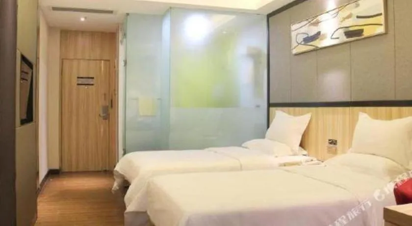 Bed in Wenxing Hotel Guangzhou Gangding Metro Station Branch