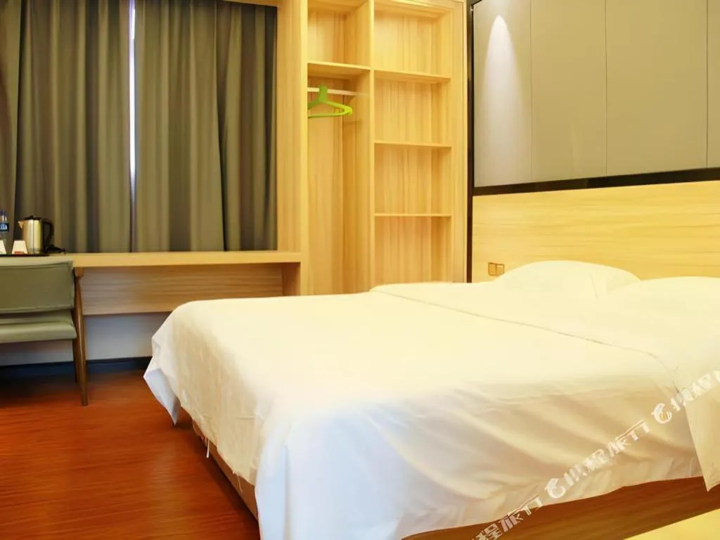 Bed in Wenxing Hotel Guangzhou Gangding Metro Station Branch