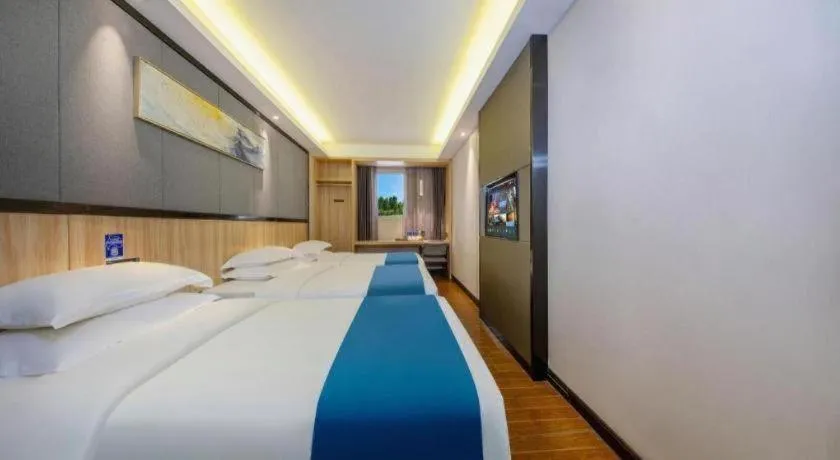 Bed in Wenxing Hotel Guangzhou Gangding Metro Station Branch