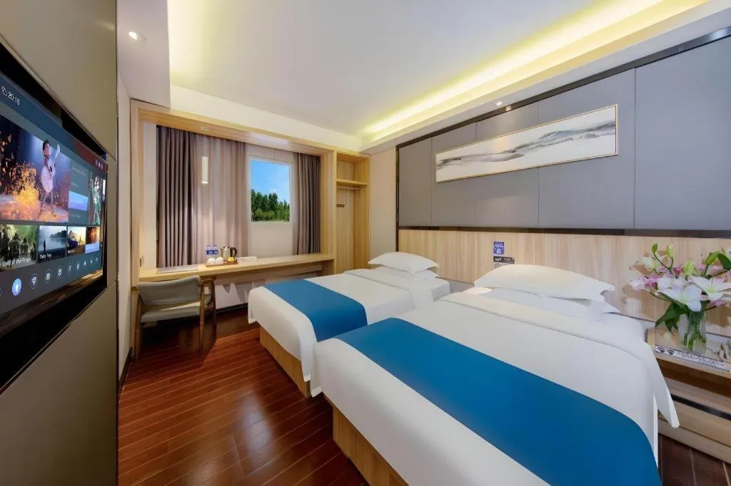 Bed in Wenxing Hotel Guangzhou Gangding Metro Station Branch