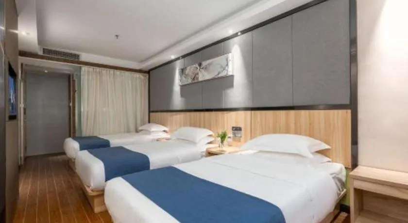 Bed in Wenxing Hotel Guangzhou Gangding Metro Station Branch