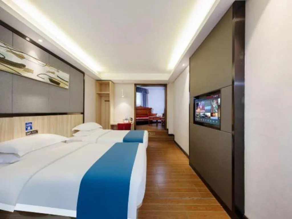 Bed in Wenxing Hotel Guangzhou Gangding Metro Station Branch