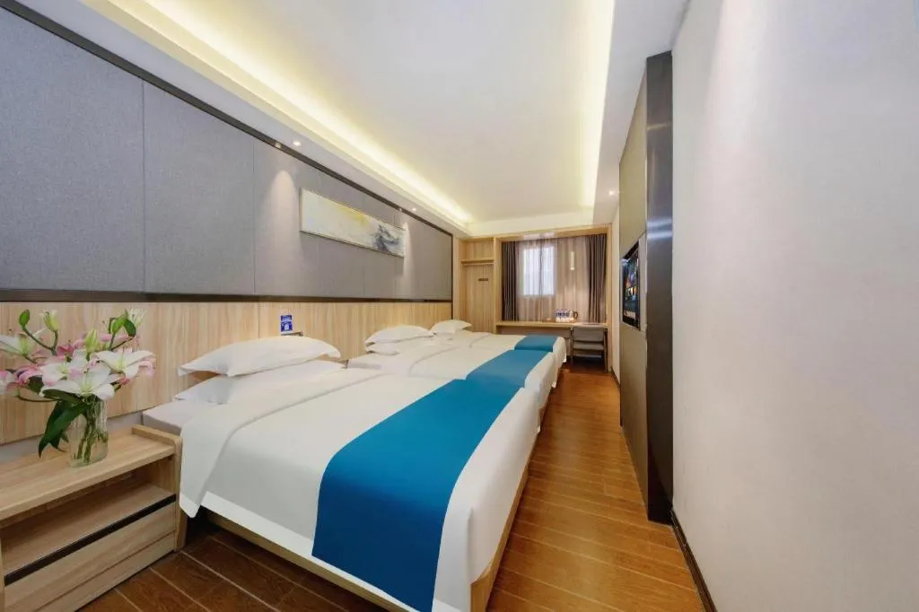 Bed in Wenxing Hotel Guangzhou Gangding Metro Station Branch