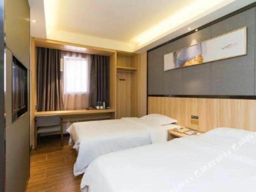 Bed in Wenxing Hotel Guangzhou Gangding Metro Station Branch