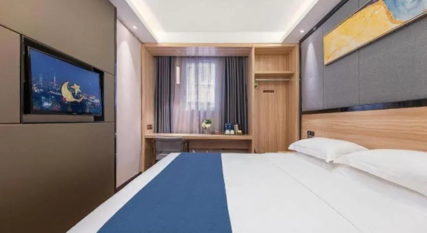 Bed in Wenxing Hotel Guangzhou Gangding Metro Station Branch