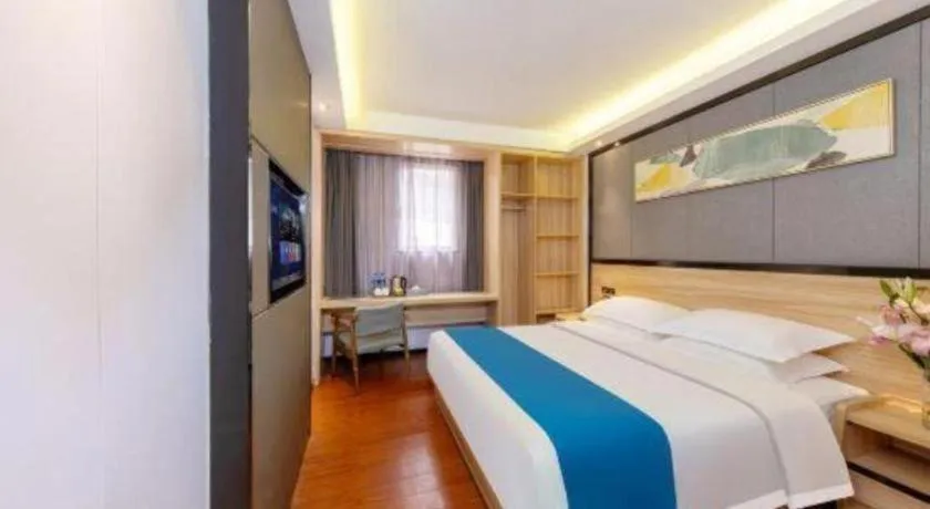 Bed in Wenxing Hotel Guangzhou Gangding Metro Station Branch