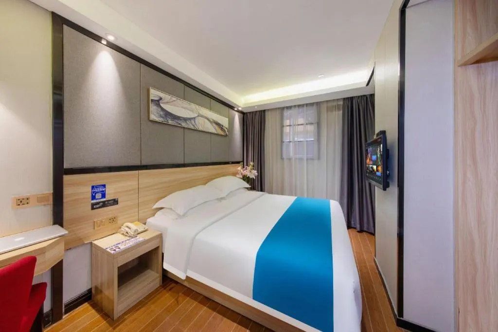Bed in Wenxing Hotel Guangzhou Gangding Metro Station Branch