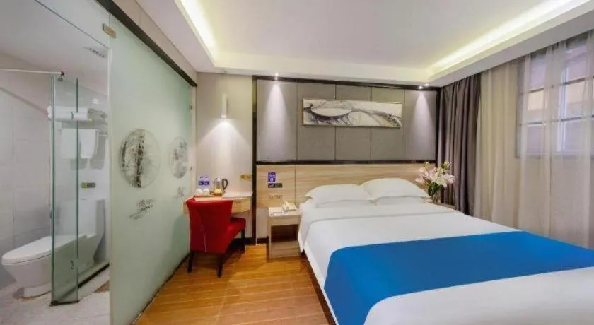 Bed in Wenxing Hotel Guangzhou Gangding Metro Station Branch