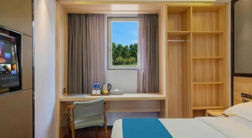 Bed in Wenxing Hotel Guangzhou Gangding Metro Station Branch