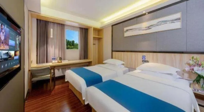 Bed in Wenxing Hotel Guangzhou Gangding Metro Station Branch