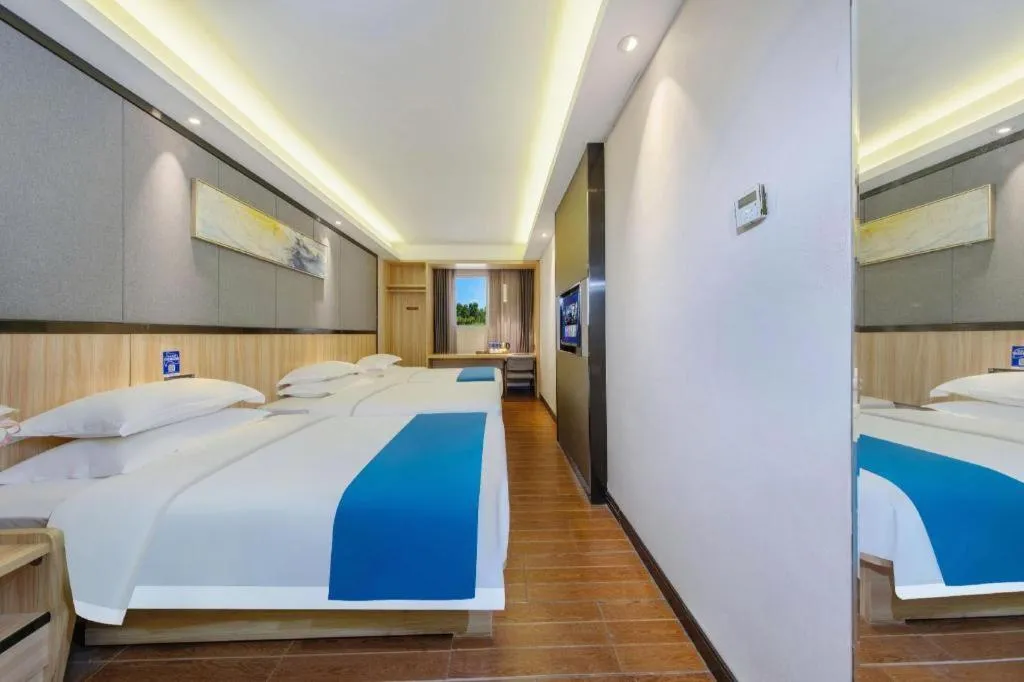 Bed in Wenxing Hotel Guangzhou Gangding Metro Station Branch