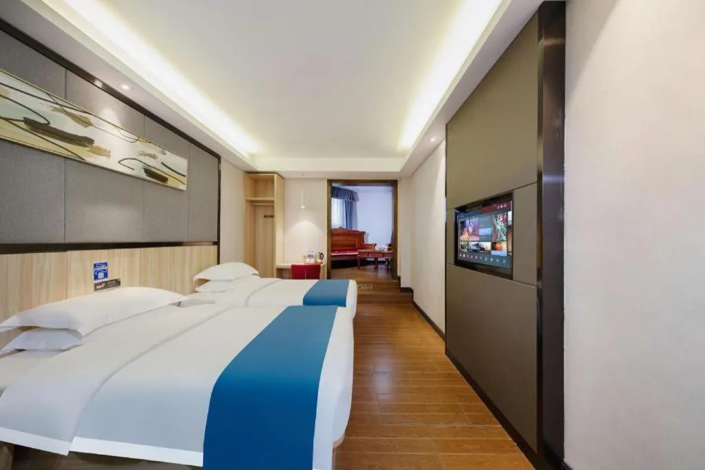 Bed in Wenxing Hotel Guangzhou Gangding Metro Station Branch