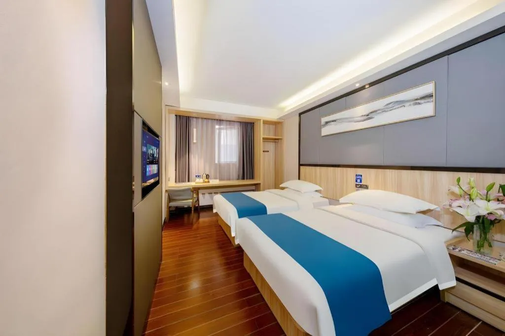 Bed in Wenxing Hotel Guangzhou Gangding Metro Station Branch