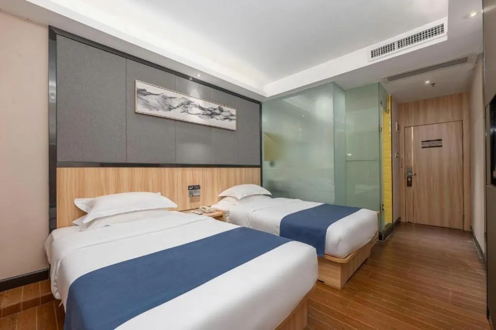 Bed in Wenxing Hotel Guangzhou Gangding Metro Station Branch