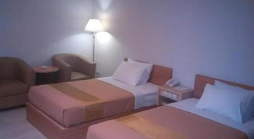 Bed in Grand Dian Hotel Slawi