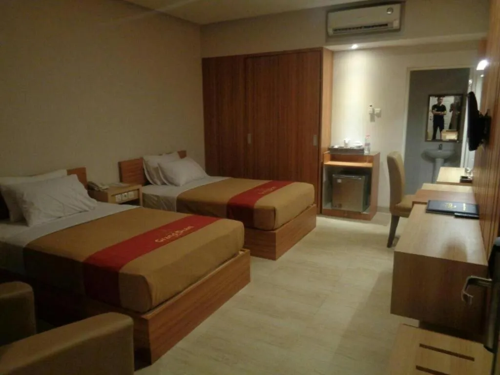 Bed in Grand Dian Hotel Slawi