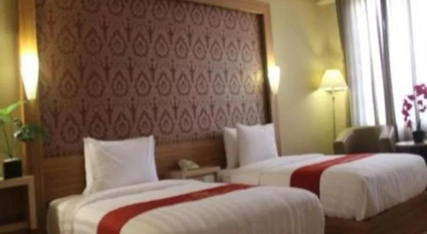 Bed in Grand Dian Hotel Slawi