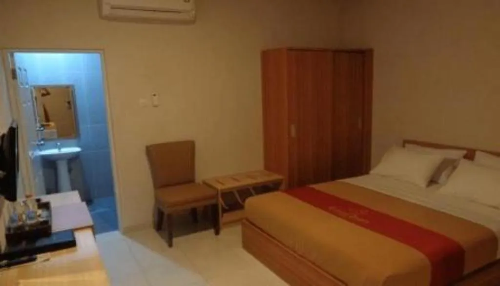Bed in Grand Dian Hotel Slawi