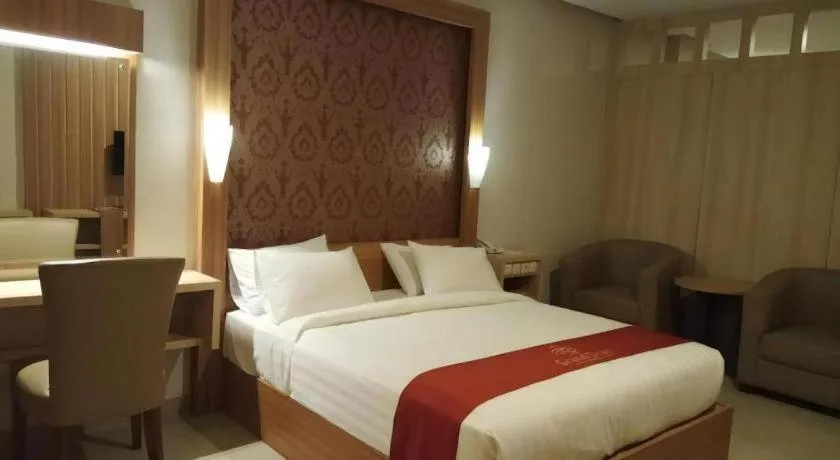 Bed in Grand Dian Hotel Slawi