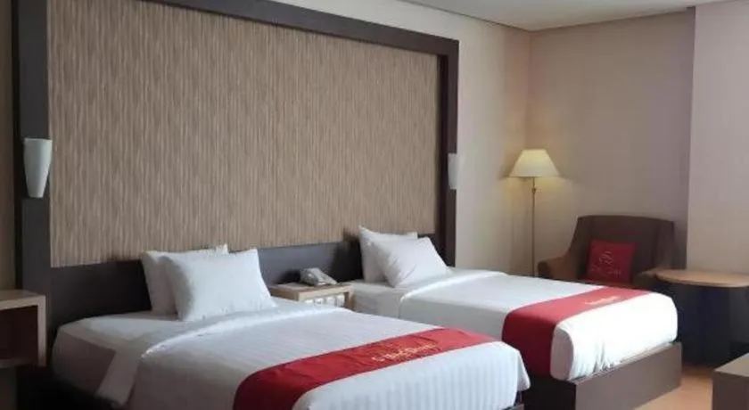 Bed in Grand Dian Hotel Slawi