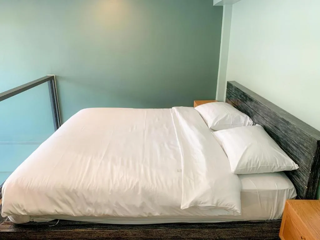 Bed in Eco Cozy Beachfront Resort Chaam