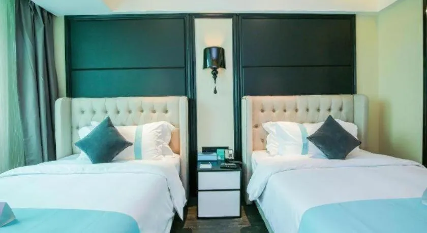 Bed in Xana Hotelle·Xiamen Railway Station