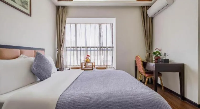 Bed in Oriental Hotel