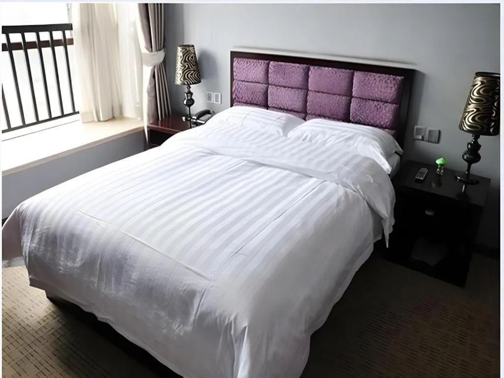 Bed in Oriental Hotel