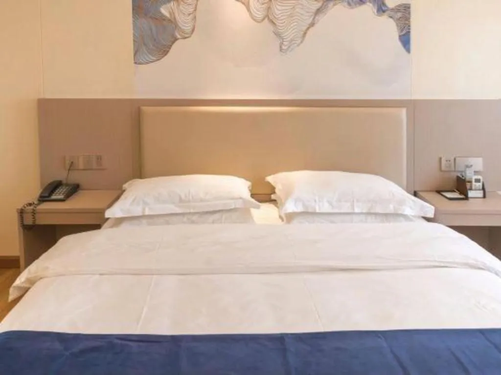 Bed in Oriental Hotel