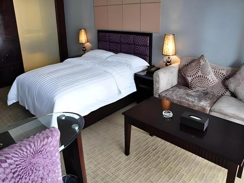 Bed in Oriental Hotel