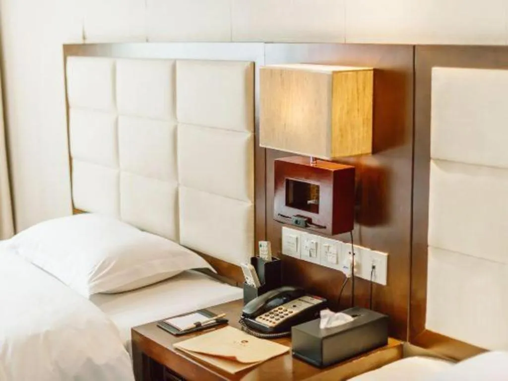 Bed in Oriental Hotel